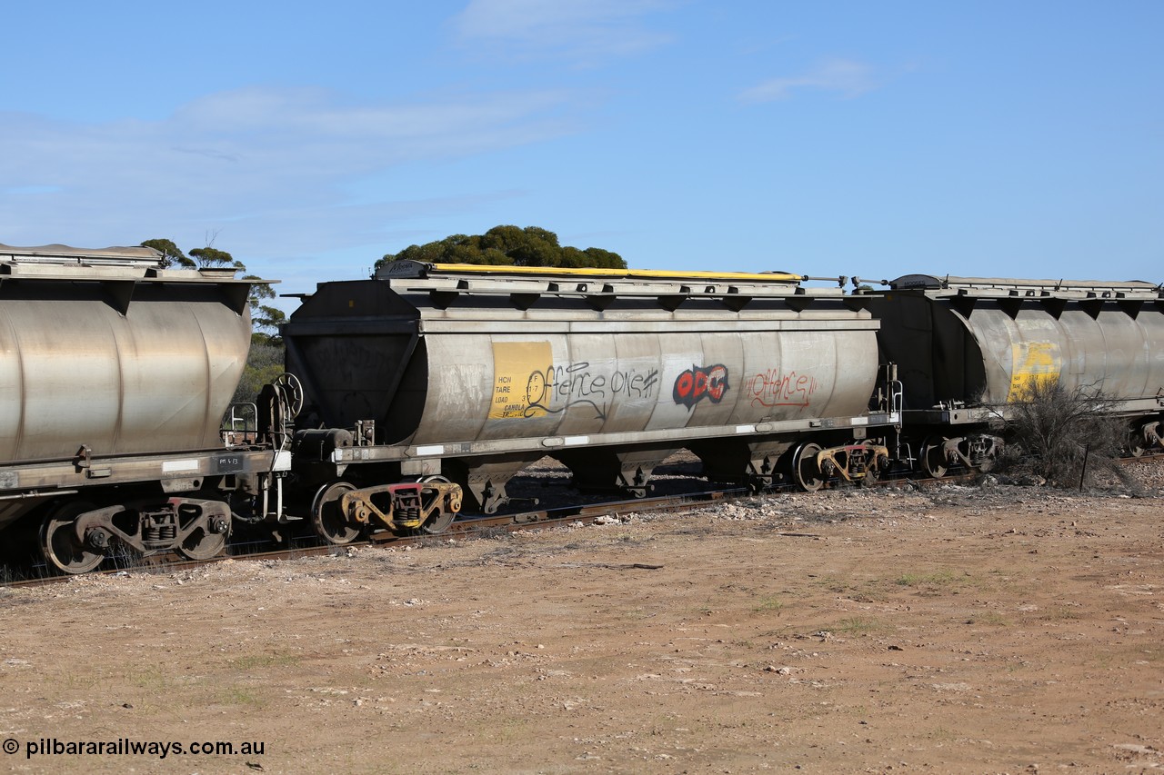 130704 0455
Kyancutta, HCN type bogie grain hopper waggon HCN 2, originally an NHB type hopper built by Tulloch Ltd for the Commonwealth Railways North Australia Railway. One of forty rebuilt by Islington Workshops 1978-79 to the HCN type with a 36 ton rating, increased to 40 tonnes in 1984. Seen here loaded with grain with a Moose Metalworks roll-top cover.
Keywords: HCN-type;HCN2;SAR-Islington-WS;rebuild;Tulloch-Ltd-NSW;NHB-type;NHB1589;