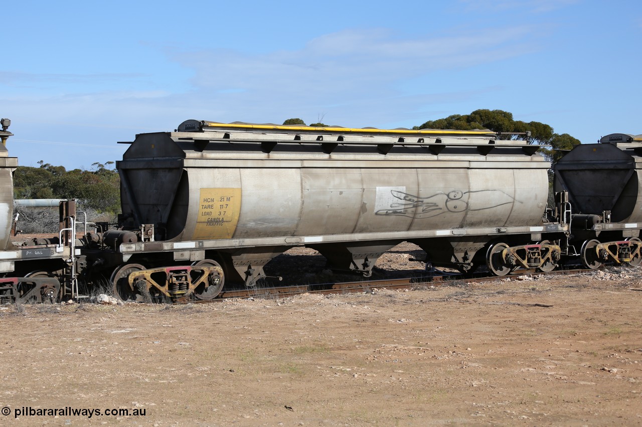 130704 0480
Kyancutta, HCN type bogie grain hopper waggon HCN 21, originally an NHB type hopper built by Tulloch Ltd for the Commonwealth Railways North Australia Railway. One of forty rebuilt by Islington Workshops 1978-79 to the HCN type with a 36 ton rating, increased to 40 tonnes in 1984. Seen here loaded with grain with a Moose Metalworks roll-top cover.
Keywords: HCN-type;HCN21;SAR-Islington-WS;rebuild;Tulloch-Ltd-NSW;NHB-type;NHB1572;