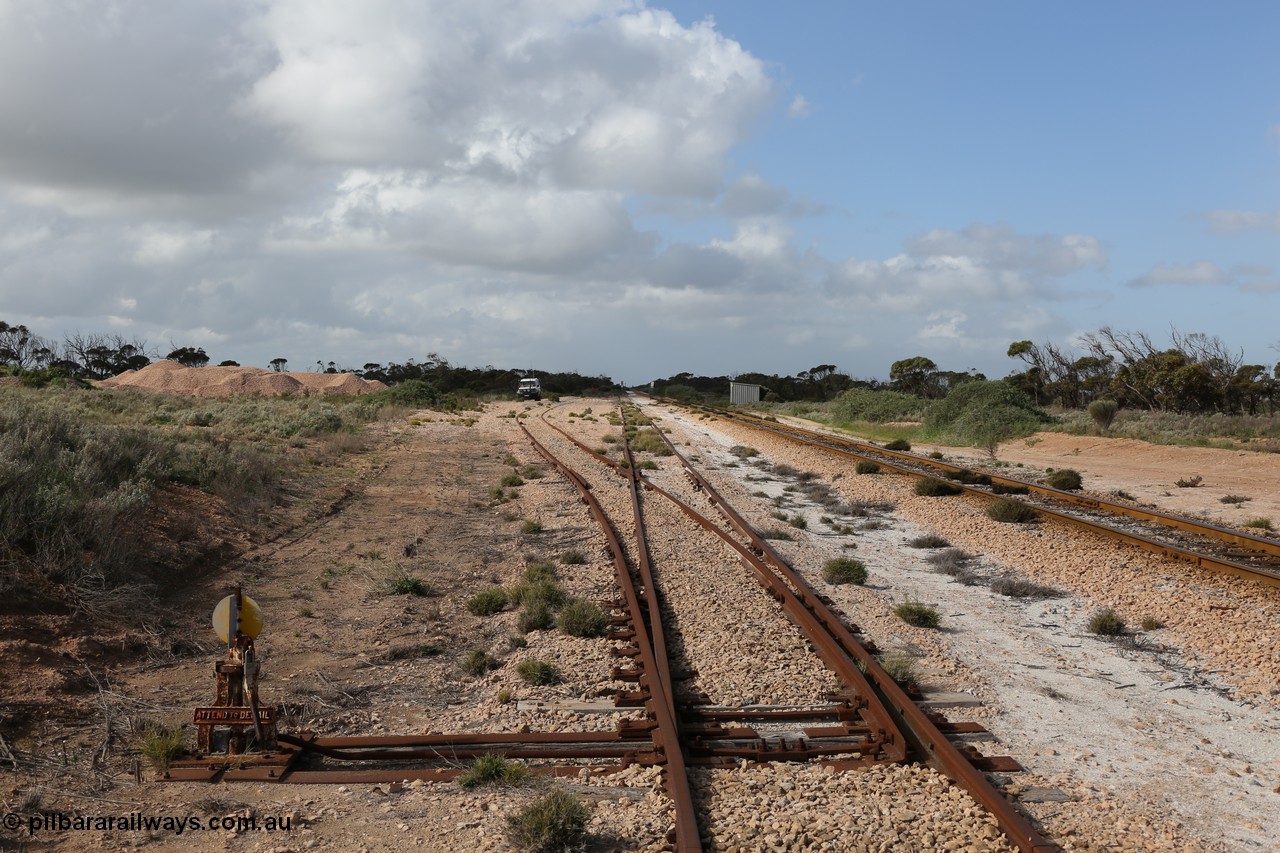 130704 0492
Moule, yard view looking east from the points for the single ended ballast siding with ballast pile of the left. Moule located at the 445.6 km was opened in February 1966 when the Direct Line between Ceduna and Kevin was opened. It hosts a crossing loop and ballast loading siding, [url=https://goo.gl/maps/14Xf9VRbSC6hkoQz5]Location is here[/url]. 4th July 2013.
