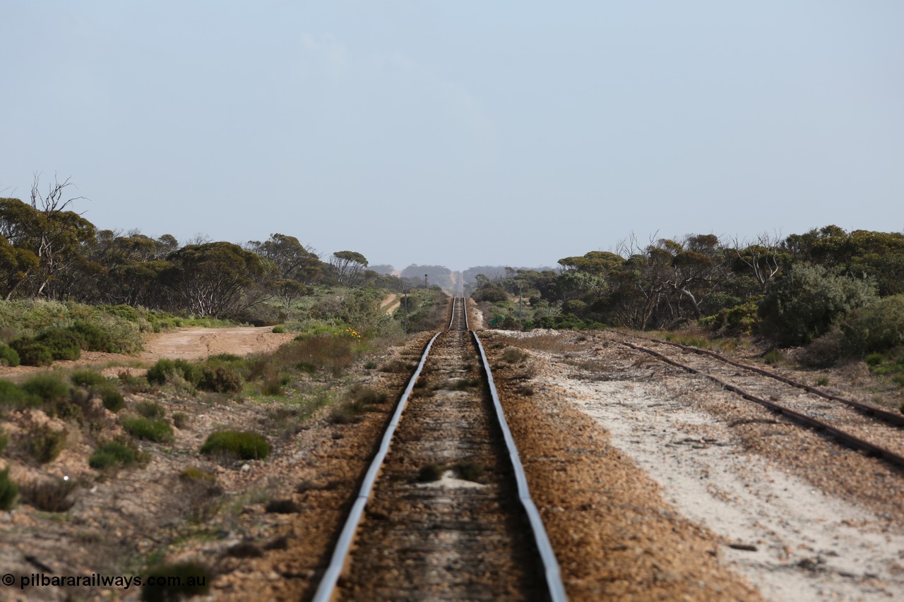 130704 0494
Moule, looking west towards Charra and Kevin along the roller coaster grades with the crossing loop on the right and the points for the ballast siding just behind the camera. [url=https://goo.gl/maps/A5rnx4Bauvi3VXyj7]Location here[/url], 4th July 2013.
