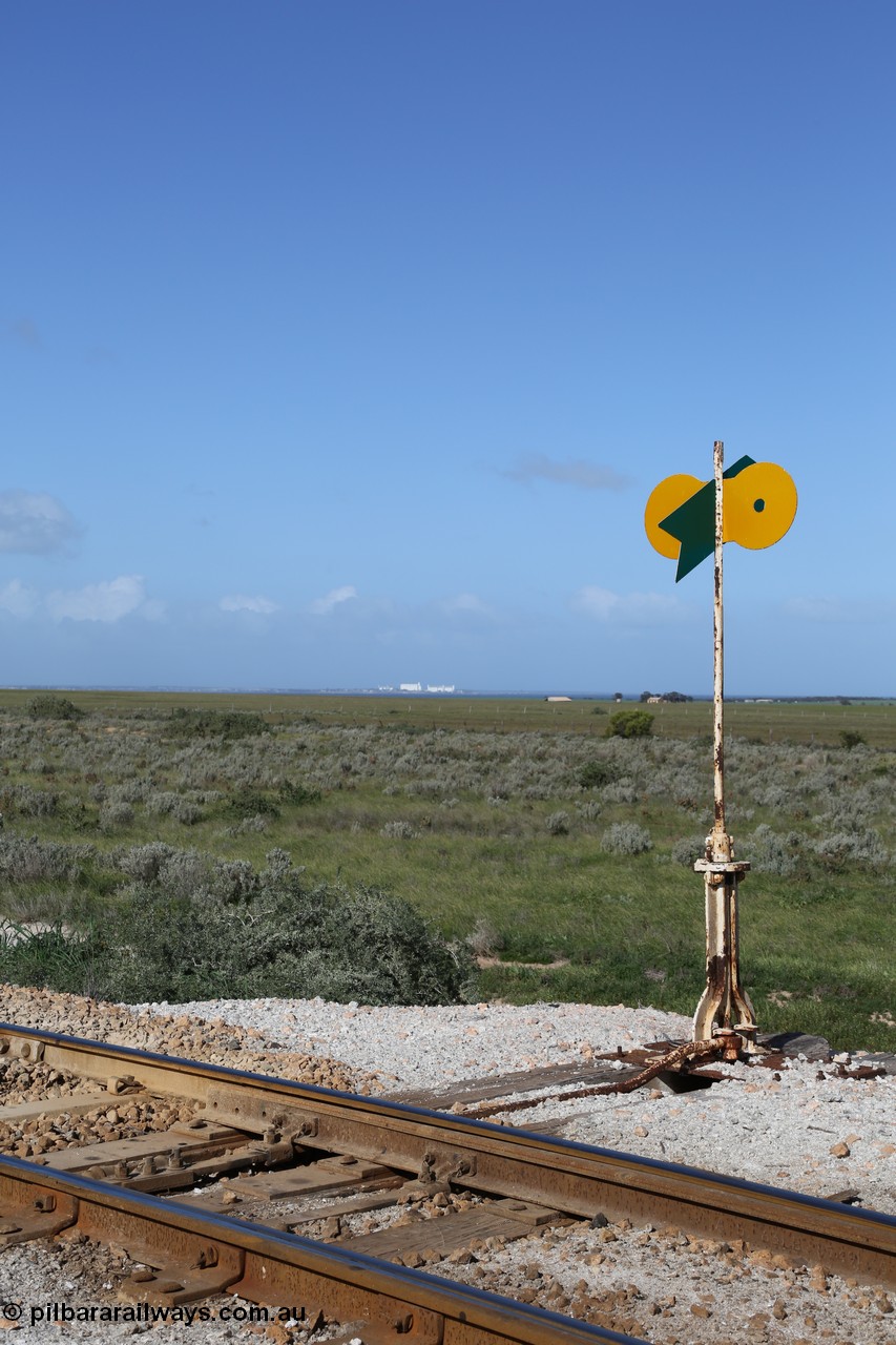 130704 0502
Moule, view of the point lever and indicator with the massive silo complex of Thevenard in the distance across the water, they are approximately 13 km away, [url=https://goo.gl/maps/ao6wATsRucn46d2c7]location here[/url]. 4th July 2013.
