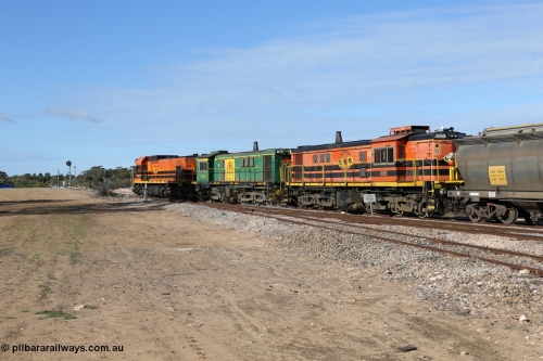 130704 0383
Kyancutta, south bound loaded grain train has stopped here to collect a loaded rack of grain waggons, seen here running out of the 'new grain siding' added in 1970 behind EMD 1204 and twin ALCo 830 units 873 and 851. July 4, 2006.
Keywords: 830-class;851;AE-Goodwin;ALCo;DL531;84137;