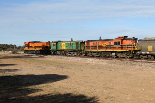 130704 0387
Kyancutta, south bound loaded grain train has stopped here to collect a loaded rack of grain waggons, seen here running out of the 'new grain siding' added in 1970 behind EMD 1204 and twin ALCo 830 units 873 and 851. July 4, 2006.
Keywords: 830-class;851;AE-Goodwin;ALCo;DL531;84137;