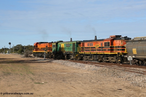 130704 0393
Kyancutta, south bound loaded grain train has stopped here to collect a loaded rack of grain waggons, seen here running out of the 'new grain siding' added in 1970 behind EMD 1204 and twin ALCo 830 units 873 and 851. 4th July 2013.
Keywords: 830-class;851;AE-Goodwin;ALCo;DL531;84137;