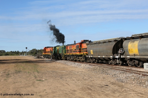 130704 0418
Kyancutta, south bound loaded grain train has stopped here to collect a loaded rack of grain waggons, seen here backing up to re-join the rest of the train on the mainline with one of only three electric signals on the network, behind EMD 1204 and twin ALCo 830 units 873 and 851. July 4, 2006.
Keywords: HAN-type;HAN54;1969-73/68-54;SAR-Islington-WS;