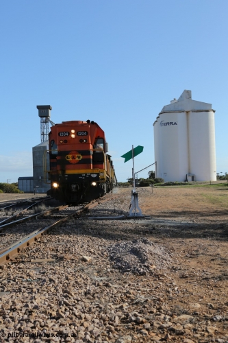 130704 0432
Kyancutta, 1200 class unit 1204 wearing current owner Genesee & Wyoming livery is a Clyde Engineering built EMD G12C model with serial 65-428 heads up a loaded grain train as it undertakes a brake test following shunting to attach a further fourteen waggons. July 4, 2006.
Keywords: 1200-class;1204;Clyde-Engineering-Granville-NSW;EMD;G12C;65-428;A-class;A1514;