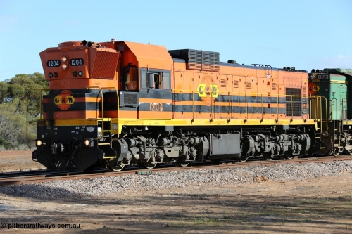 130704 0437
Kyancutta, 1200 class unit 1204 wearing current owner Genesee & Wyoming livery is a Clyde Engineering built EMD G12C model with serial 65-428 was originally built in 1965 for Western Mining Corporation and operated by the WAGR as their A class A 1514 recoded to 1204 in April 2004 and to the Eyre Peninsula in July 2004.
Keywords: 1200-class;1204;Clyde-Engineering-Granville-NSW;EMD;G12C;65-428;A-class;A1514;