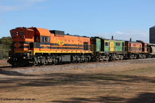 130704 0439
Kyancutta, 1200 class unit 1204 wearing current owner Genesee & Wyoming livery is a Clyde Engineering built EMD G12C model with serial 65-428 was originally built in 1965 for Western Mining Corporation and operated by the WAGR as their A class A 1514 recoded to 1204 in April 2004 and to the Eyre Peninsula in July 2004, former Australian National narrow gauge 830 class locomotive 873, an AE Goodwin built ALCo DL531 model with serial G3422-3 built new for the SAR in 1966 and delivered new to Port Lincoln in April 1966 with decals for current owner Genesee & Wyoming, it has spent it's whole working life on the Eyre Peninsula and former Australian National narrow gauge 830 class locomotive 851, an AE Goodwin built ALCo DL531 model with serial 84737 built new for the SAR in 1962 and delivered new to Port Lincoln in April 1962 wearing current owner Genesee & Wyoming's livery, it has also spent it's whole working life on the Eyre Peninsula. July 4, 2006.
Keywords: 1200-class;1204;Clyde-Engineering-Granville-NSW;EMD;G12C;65-428;A-class;A1514;