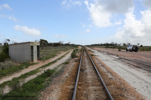 130704 0489
Moule, yard overview looking west, Moule located at the 445.6 km was opened in February 1966 when the Direct Line between Ceduna and Kevin was opened. From the left is the Mallee style shelter shed, mainline, crossing loop and ballast siding. [url=https://goo.gl/maps/KTtpy7LJB4tmHaTt6]Location is here[/url]. July 4, 2006.
