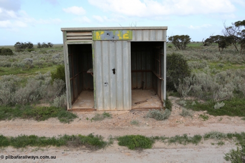 130704 0491
Moule, Mallee style shelter shed as a station 'building' of sorts. Moule was opened in February 1966 when the Direct Line between Ceduna and Kevin was opened. It hosts a crossing loop and ballast loading siding, [url=https://goo.gl/maps/KTtpy7LJB4tmHaTt6]Location is here[/url]. July 4, 2006.

