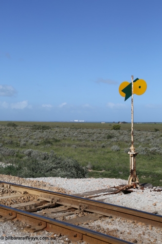 130704 0501
Moule, view of the point lever and indicator with the massive silo complex of Thevenard in the distance across the water, they are approximately 13 km away, [url=https://goo.gl/maps/ao6wATsRucn46d2c7]location here[/url]. July 4, 2006.
