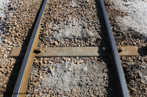 130704 0504
Moule, Trak-Lok M7.5 steel sleeper for 31 kg/m rail manufactured by BHP in 1996, the 7.5 is the thickness in millimetres of the steel used. July 4, 2006.

