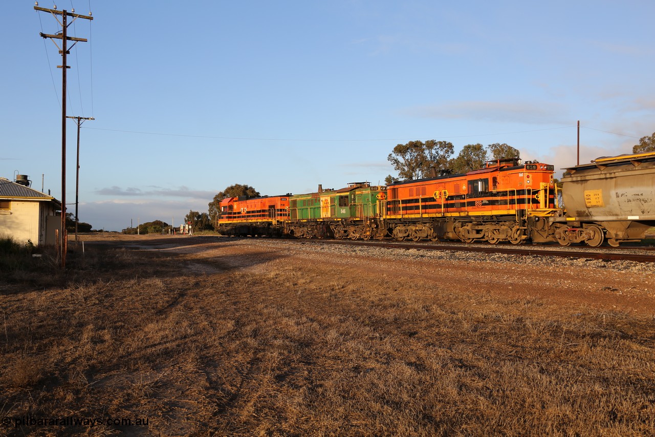 130705 0526
Lock, 1203, 846 and 859 shunt their loading grain train out of the siding onto the mainline. Genesee & Wyoming locomotive AE Goodwin ALCo model DL531 unit 859 'City of Port Lincoln' serial 84705, built in 1963, 859 started life at Peterborough, spent some years in Tasmania and even spent time in Perth on standard gauge in 2002 before being repainted and transferred to the Eyre Peninsula system in 2003. The barracks are just visible at left. 5th of July 2013.
Keywords: 830-class;859;84137;AE-Goodwin;ALCo;DL531;