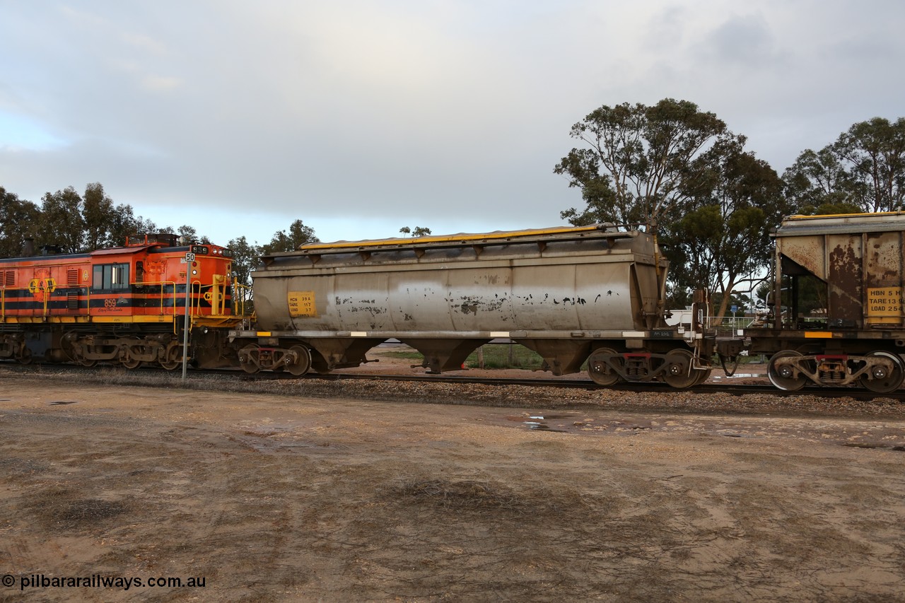 130705 0552
Lock, HCN type bogie grain hopper waggon HCN 39, originally an NHB type hopper NHB 1573 built by Tulloch Ltd for the Commonwealth Railways North Australia Railway. One of forty rebuilt by Islington Workshops 1978-79 to the HCN type with a 36 ton rating, increased to 40 tonnes in 1984. Fitted with a Moose Metalworks roll-top cover. 5th July 2013.
Keywords: HCN-type;HCN39;SAR-Islington-WS;rebuild;Tulloch-Ltd-NSW;NHB-type;NHB1573;