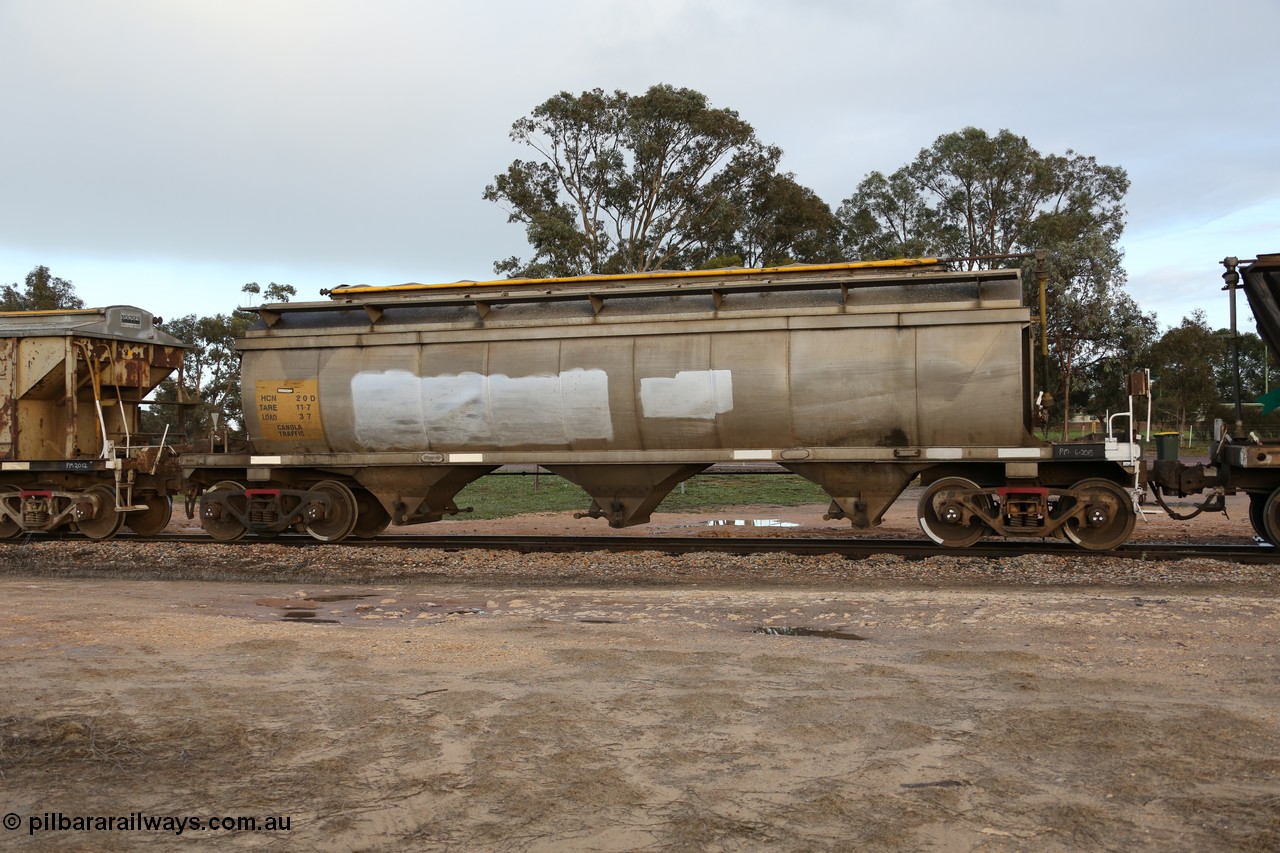 130705 0556
Lock, HCN type bogie grain hopper waggon HCN 20, originally an NHB type hopper NHB 1594 built by Tulloch Ltd for the Commonwealth Railways North Australia Railway. One of forty rebuilt by Islington Workshops 1978-79 to the HCN type with a 36 ton rating, increased to 40 tonnes in 1984. Fitted with a Moose Metalworks roll-top cover. 5th July 2013.
Keywords: HCN-type;HCN20;SAR-Islington-WS;rebuild;Tulloch-Ltd-NSW;NHB-type;NHB1594;