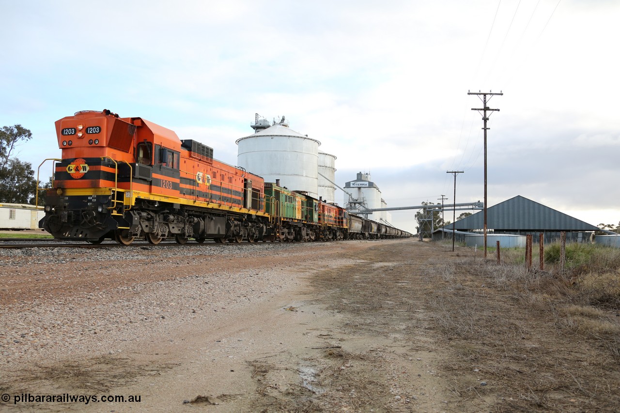 130705 0581
Lock, located at the 148.5 km and originally named Terre when opened in May 1913, later renamed to Lock in December 1921. From the left background is the Ascom silo complex (Block 5), then blocks 2, 1 and 3, the train is on the mainline with the horizontal bunker (Block 4) on the right. 5th of July 2013.
Keywords: 1200-class;1203;Clyde-Engineering-Granville-NSW;EMD;G12C;65-427;A-class;A1513;