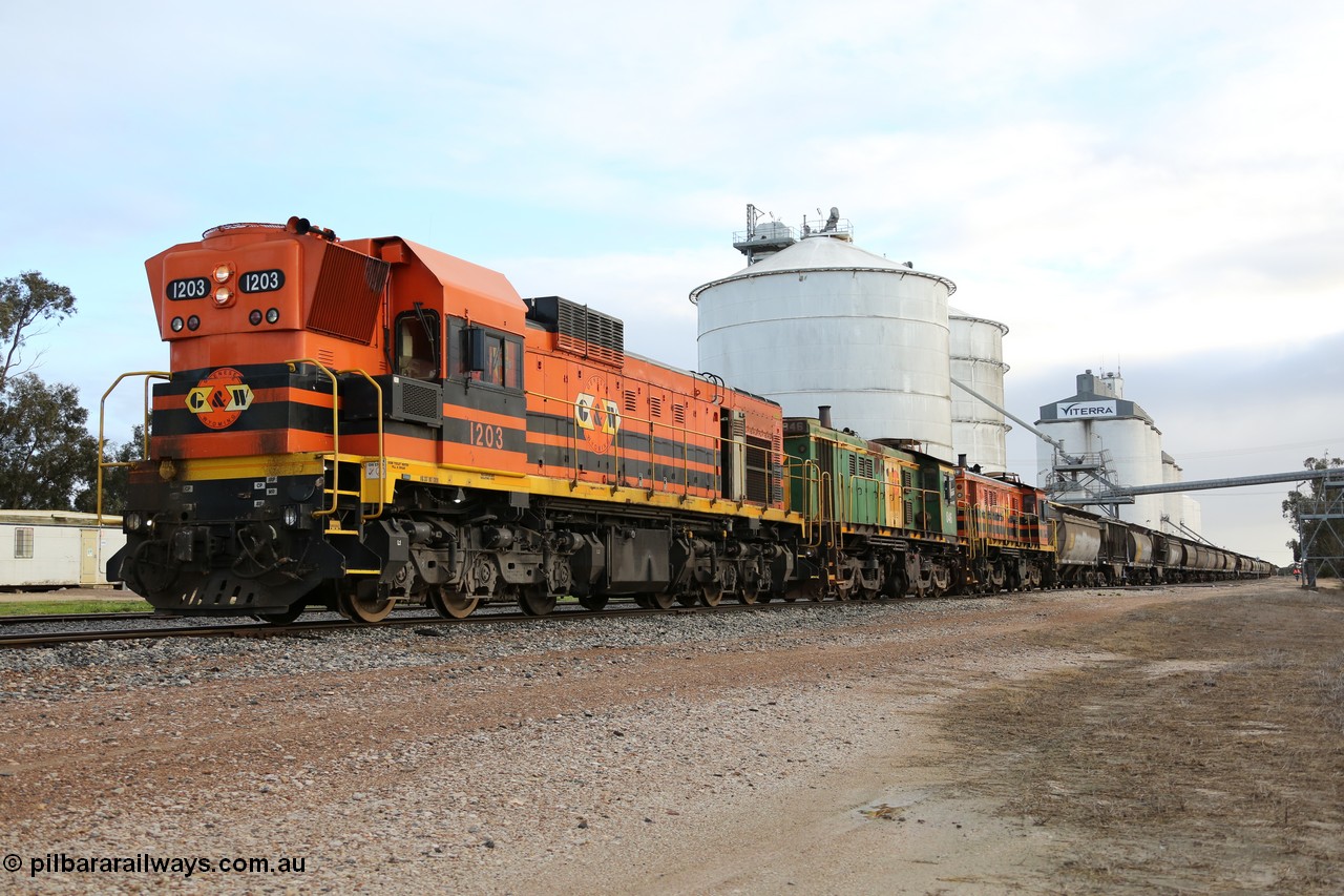 130705 0583
Lock, located at the 148.5 km and originally named Terre when opened in May 1913, later renamed to Lock in December 1921. From the left background is the Ascom silo complex (Block 5), then blocks 2, 1 and 3, the train is on the mainline with the horizontal bunker (Block 4) on the right. 5th of July 2013.
Keywords: 1200-class;1203;Clyde-Engineering-Granville-NSW;EMD;G12C;65-427;A-class;A1513;