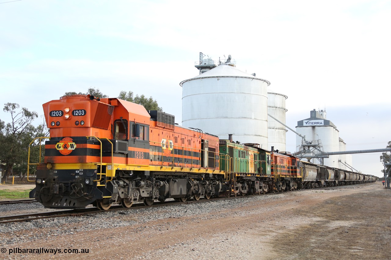 130705 0585
Lock, located at the 148.5 km and originally named Terre when opened in May 1913, later renamed to Lock in December 1921. From the left background is the Ascom silo complex (Block 5), then blocks 2, 1 and 3, the train is on the mainline with the horizontal bunker (Block 4) on the right. 5th of July 2013.
Keywords: 1200-class;1203;Clyde-Engineering-Granville-NSW;EMD;G12C;65-427;A-class;A1513;