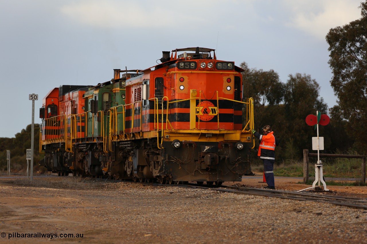 130705 0588
Lock, having stowed the loaded portion on the mainline, the three locos 859, 846 and 1203 shunt back on to the empty portion on goods siding #1. 
Keywords: 830-class;859;AE-Goodwin;ALCo;DL531;84705;