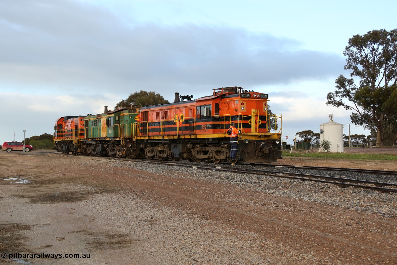 130705 0590
Lock, having stowed the loaded portion on the mainline, the three locos 859, 846 and 1203 shunt back on to the empty portion on goods siding #1. 
Keywords: 830-class;859;AE-Goodwin;ALCo;DL531;84705;