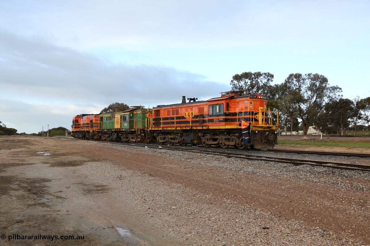130705 0591
Lock, having stowed the loaded portion on the mainline, the three locos 859, 846 and 1203 shunt back on to the empty portion on goods siding #1. 
Keywords: 830-class;859;AE-Goodwin;ALCo;DL531;84705;
