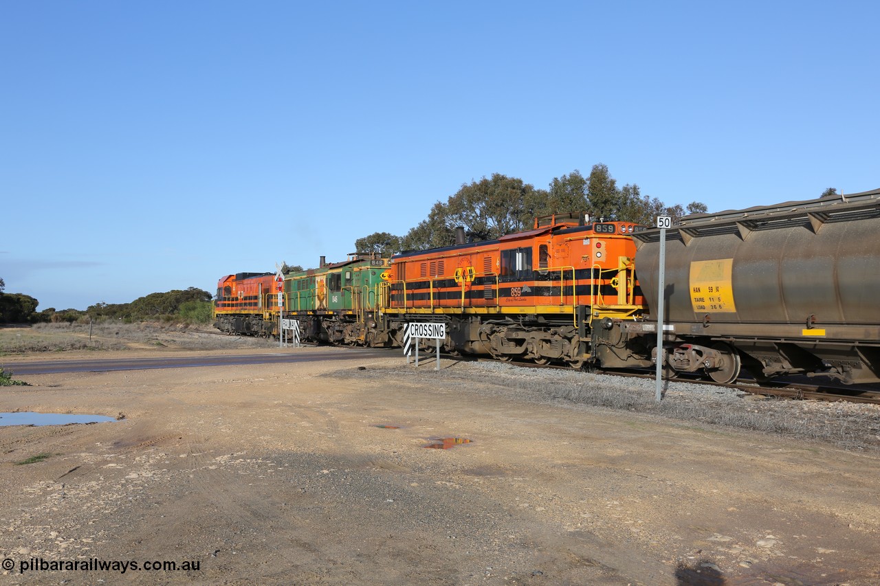 130705 0625
Lock, with loading finished, 1203 leads 846, 859 and the final portion out along the mainline out of goods siding #1 as it prepares to shunt back onto the loaded portion on the mainline for departure to Port Lincoln.
Keywords: 830-class;859;AE-Goodwin;ALCo;DL531;84705;