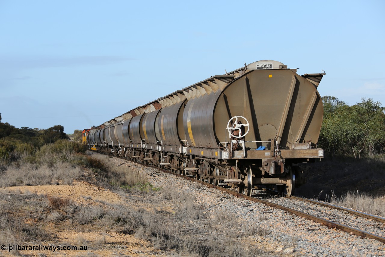 130705 0630
Lock, the final loaded portion shunts up the mainline before rejoining the first portion sitting on the mainline in the yard, HAN type bogie grain hopper waggon HAN 38, one of sixty eight units built by South Australian Railways Islington Workshops between 1969 and 1973 as the HAN type for the Eyre Peninsula system.
Keywords: HAN-type;HAN38;1969-73/68-38;SAR-Islington-WS;