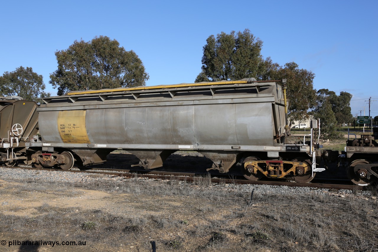 130705 0638
Lock, HCN type bogie grain hopper waggon HCN 12, originally an NHB type hopper built by Tulloch Ltd for the Commonwealth Railways North Australia Railway. One of forty rebuilt by Islington Workshops 1978-79 to the HCN type with a 36 ton rating, increased to 40 tonnes in 1984. Seen here loaded with grain with a Moose Metalworks roll-top cover.
Keywords: HCN-type;HCN12;SAR-Islington-WS;rebuild;Tulloch-Ltd-NSW;NHB-type;NHB1591;