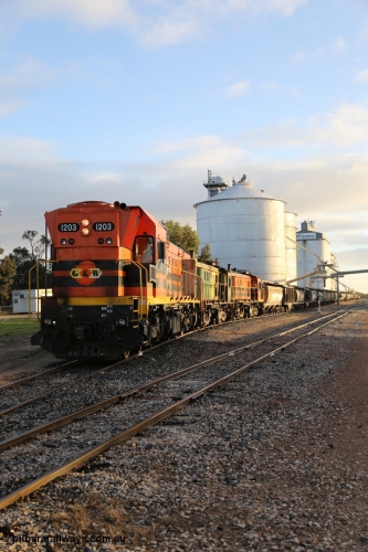 130705 0518
Lock, grain train loading in progress with the Viterra fast flow auger in the distance, the train with 1203, 846 and 859 is about to split and shunt half the consist onto the mainline. July 5, 2013.
Keywords: 1200-class;1203;Clyde-Engineering-Granville-NSW;EMD;G12C;65-427;A-class;A1513;