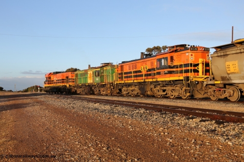 130705 0523
Lock, 1203, 846 and 859 shunt their loading grain train out of the siding onto the mainline. Genesee & Wyoming locomotive AE Goodwin ALCo model DL531 unit 859 'City of Port Lincoln' serial 84705, built in 1963, 859 started life at Peterborough, spent some years in Tasmania and even spent time in Perth on standard gauge in 2002 before being repainted and transferred to the Eyre Peninsula system in 2003. July 5, 2013.
Keywords: 830-class;859;AE-Goodwin;ALCo;DL531;84705;
