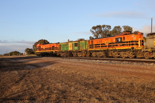 130705 0527
Lock, 1203, 846 and 859 shunt their loading grain train out of the siding onto the mainline. Genesee & Wyoming locomotive AE Goodwin ALCo model DL531 unit 859 'City of Port Lincoln' serial 84705, built in 1963, 859 started life at Peterborough, spent some years in Tasmania and even spent time in Perth on standard gauge in 2002 before being repainted and transferred to the Eyre Peninsula system in 2003. July 5, 2013.
Keywords: 830-class;859;AE-Goodwin;ALCo;DL531;84705;