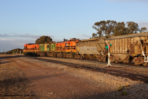 130705 0528
Lock, 1203, 846 and 859 shunt their loading grain train out of the siding onto the mainline. Genesee & Wyoming locomotive AE Goodwin ALCo model DL531 unit 859 'City of Port Lincoln' serial 84705, built in 1963, 859 started life at Peterborough, spent some years in Tasmania and even spent time in Perth on standard gauge in 2002 before being repainted and transferred to the Eyre Peninsula system in 2003. July 5, 2013.
Keywords: 830-class;859;AE-Goodwin;ALCo;DL531;84705;