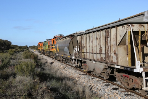 130705 0662
Lock, 1203, 846 and 859 depart along the mainline for Port Lincoln with the loaded grain train.
