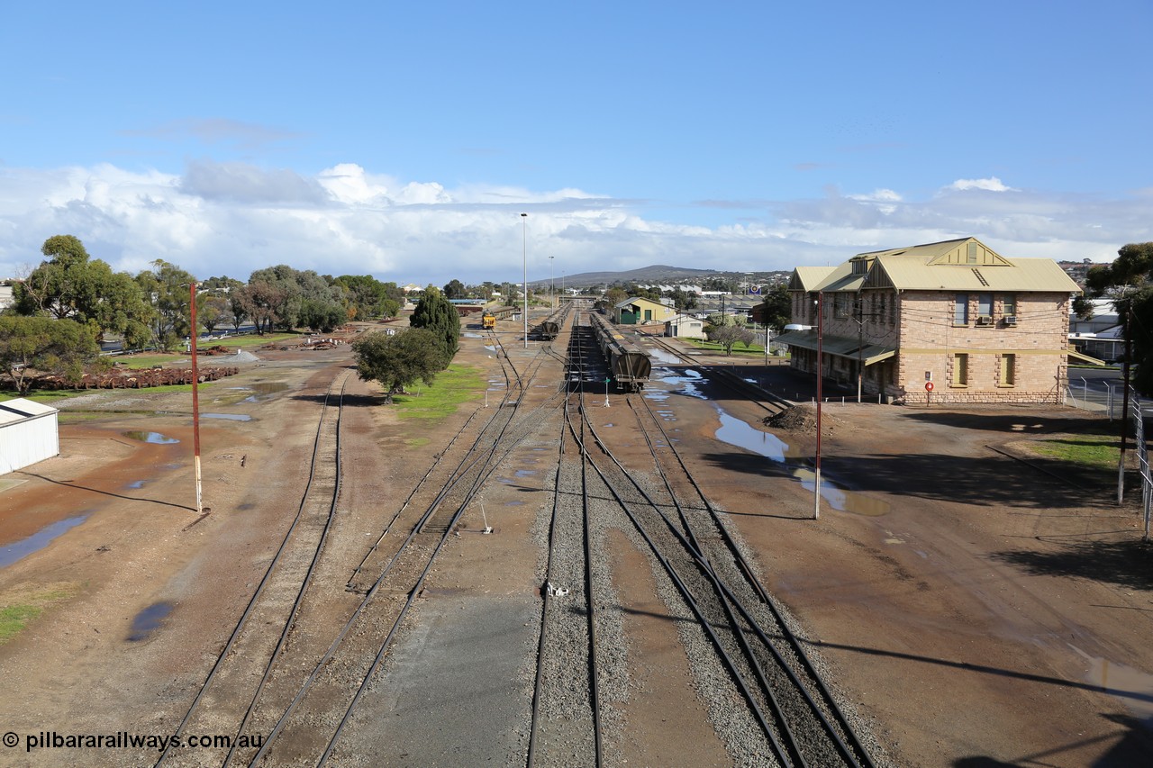 130706 0666
Port Lincoln, looking in the down direction from the London Street overbridge at the yard environs with the station at right which was Eyre Peninsula 'head offices'. 6th of July 2013.
