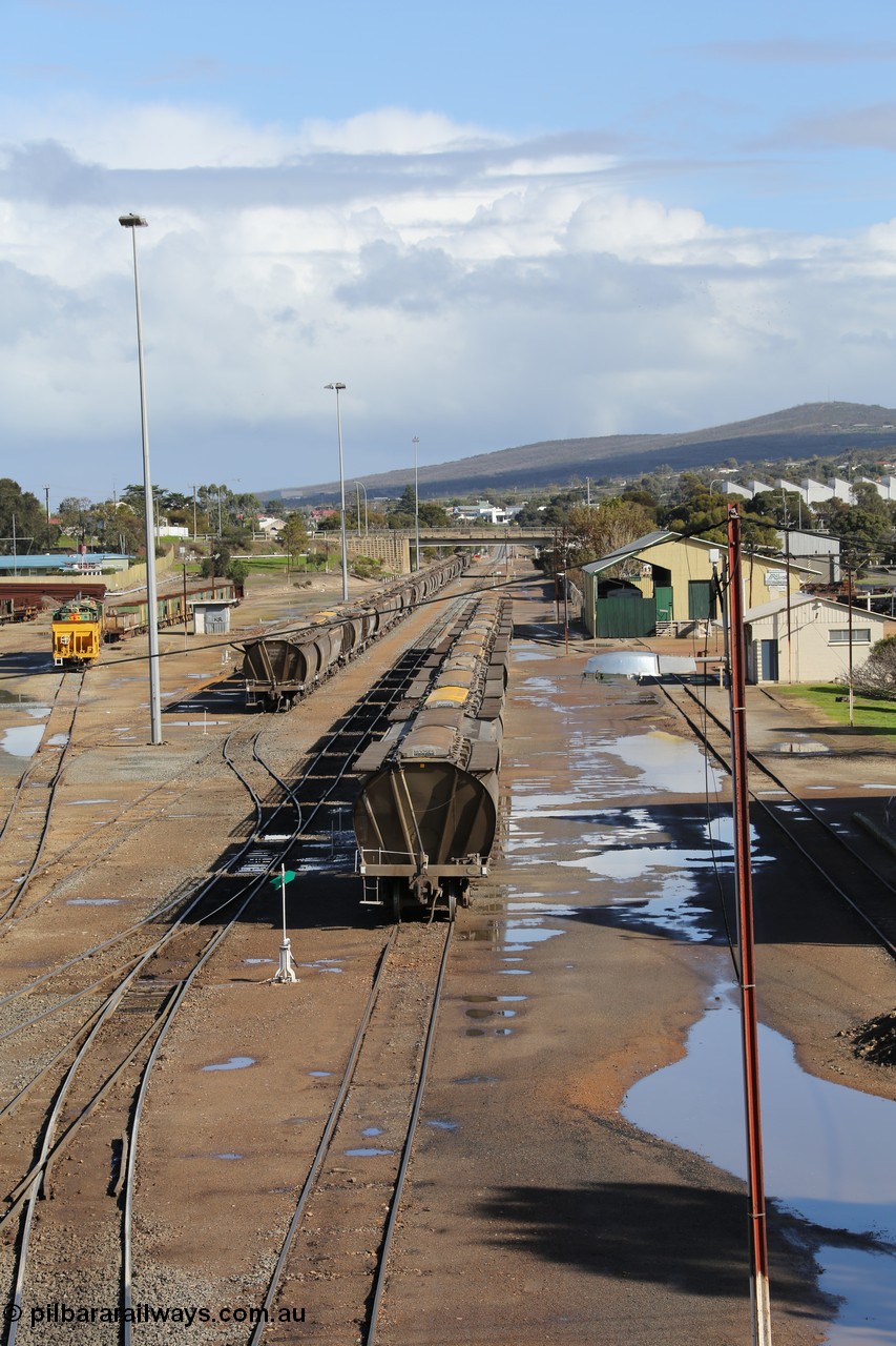 130706 0671
Port Lincoln, looking in the down direction from the London Street overbridge at the yard environs with the station at right which was Eyre Peninsula 'head offices'. 6th of July 2013.
