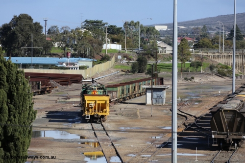 130706 0667
Port Lincoln, looking in the down direction from the London Street overbridge at the weigh bridge and stowed 830 class units and the ballast waggons. July 6, 2013.
