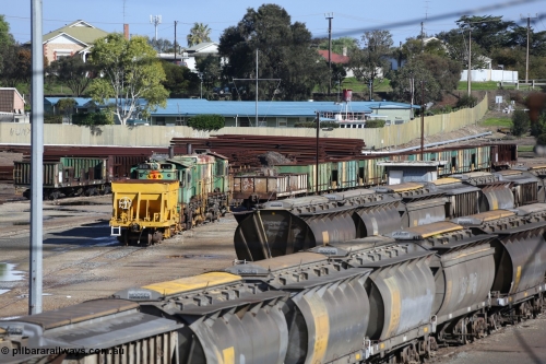 130706 0669
Port Lincoln, looking in the down direction from the London Street overbridge at the weigh bridge and stowed 830 class units and the ballast waggons. July 6, 2013.
