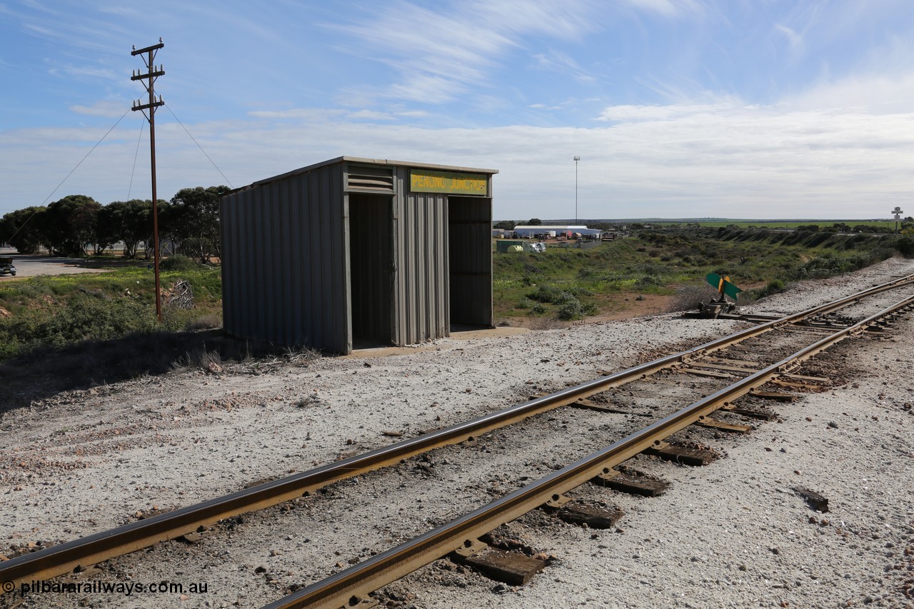 130708 0706
Penong Junction, location opened in February 1966, located at the 429.7 km, looking at the Mallee shelter shed - combined train control room, junction points and point indicator, Penong line curving around to the left.
