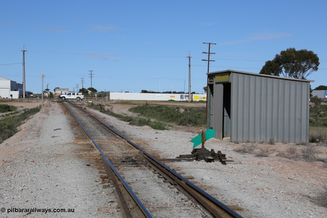 130708 0709
Penong Junction, location opened in February 1966, located at the 429.7 km, looking south from the junction points towards Ceduna and Thevenard across the grade crossing for the Eyre Highway.
