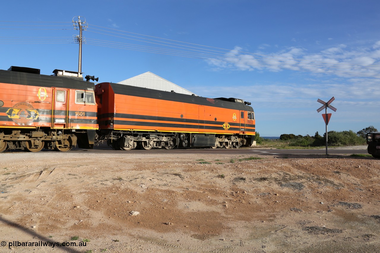 130708 0882
Thevenard, loaded train running through the back of the yard and crossing [url=https://goo.gl/maps/dgQdX]Bergmann Drive grade crossing, 434.2 km[/url].

