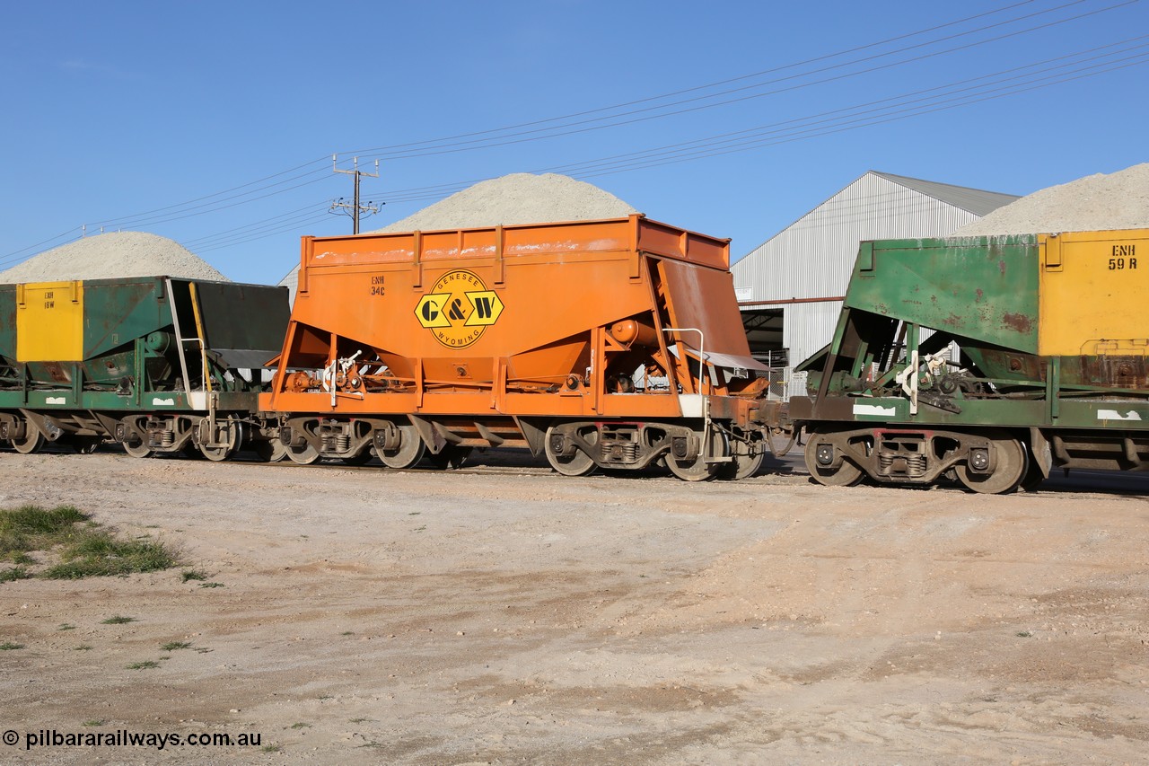 130708 0899
Thevenard originally an Kinki Sharyo built NH type for the NAR now coded ENH type ENH 34 in GWA corporate orange livery of owner Genesee & Wyoming Australia, with hungry boards still fitted loaded with gypsum crossing [url=https://goo.gl/maps/dgQdX]Bergmann Drive grade crossing, 434.2 km[/url].
Keywords: ENH-type;ENH34;Kinki-Sharyo-Japan;NH-type;NH934;