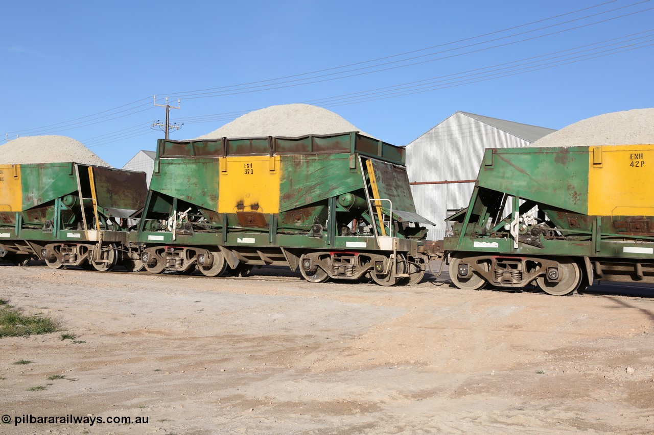 130708 0912
Thevenard originally an Kinki Sharyo built NH type for the NAR now coded ENH type ENH 37, with hungry boards still fitted, loaded with gypsum crossing [url=https://goo.gl/maps/dgQdX]Bergmann Drive grade crossing, 434.2 km[/url].
Keywords: ENH-type;ENH37;Kinki-Sharyo-Japan;NH-type;NH937;