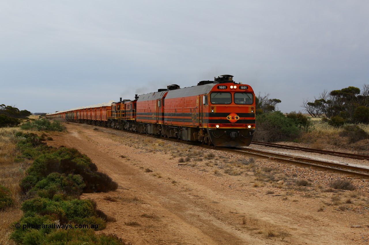 161109 1891
Moule, train 4DD4 rumbles along the mainline behind Genesee & Wyoming locomotives Clyde Engineering EMD model JL22C units 1601 serial 71-728 and 1603 serial 71-730 and a pair of AE Goodwin ALCo model DE531 units 859 serial 84705 and 850 serial 84136 with 62 loaded waggons.
Keywords: 1600-class;1601;Clyde-Engineering-Granville-NSW;EMD;JL22C;71-728;NJ-class;NJ1;