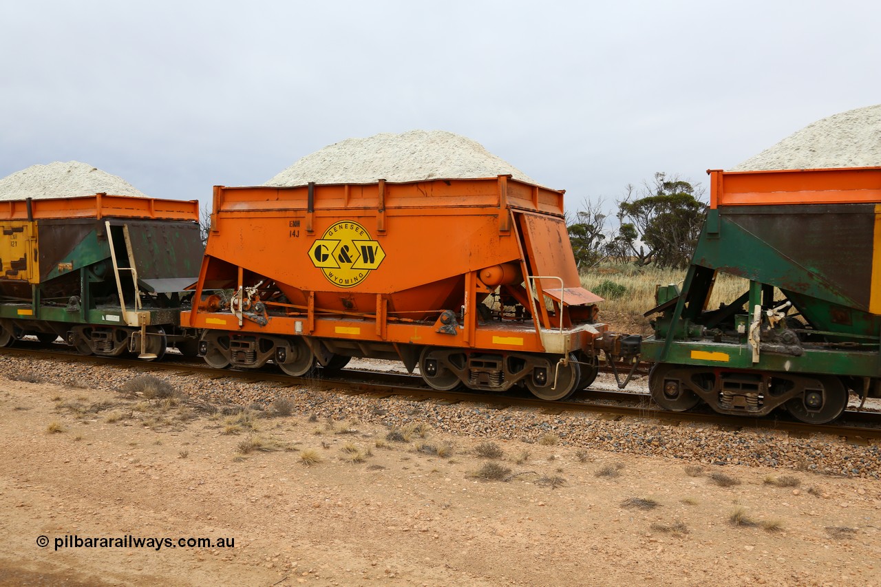 161109 1931
Moule, originally built by Kinki Sharyo as the NH type for the NAR in 1968, sent to Port Lincoln in 1978, then rebuilt and recoded ENH type in 1984, ENH 14, refurbished and wearing current owner Genesee & Wyoming orange and decal with matching hungry boards loaded with gypsum.
Keywords: ENH-type;ENH14;Kinki-Sharyo-Japan;NH-type;