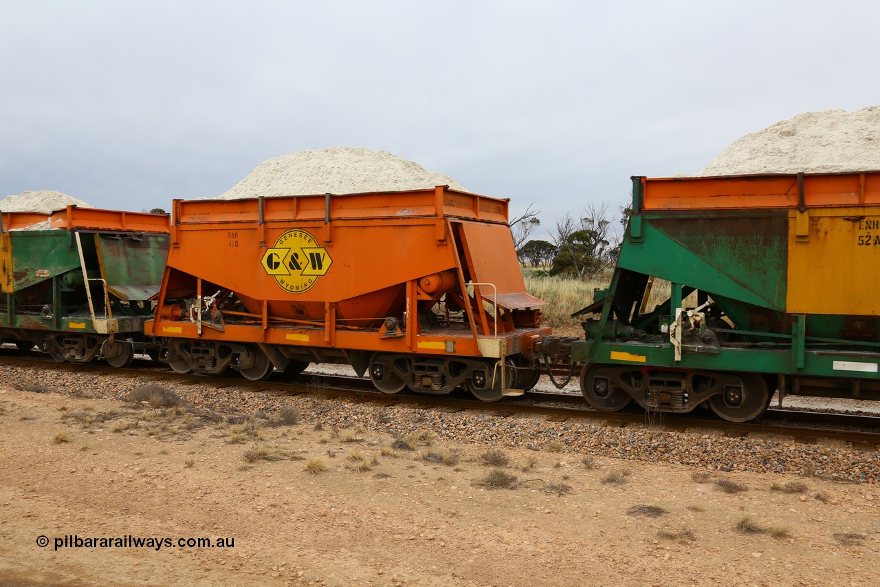 161109 1950
Moule, originally built by Kinki Sharyo as the NH type for the NAR in 1968, sent to Port Lincoln in 1978, then rebuilt and recoded ENH type in 1984, ENH 41, refurbished and wearing current owner Genesee & Wyoming orange and decal with matching hungry boards loaded with gypsum.
Keywords: ENH-type;ENH41;Kinki-Sharyo-Japan;NH-type;NH941;