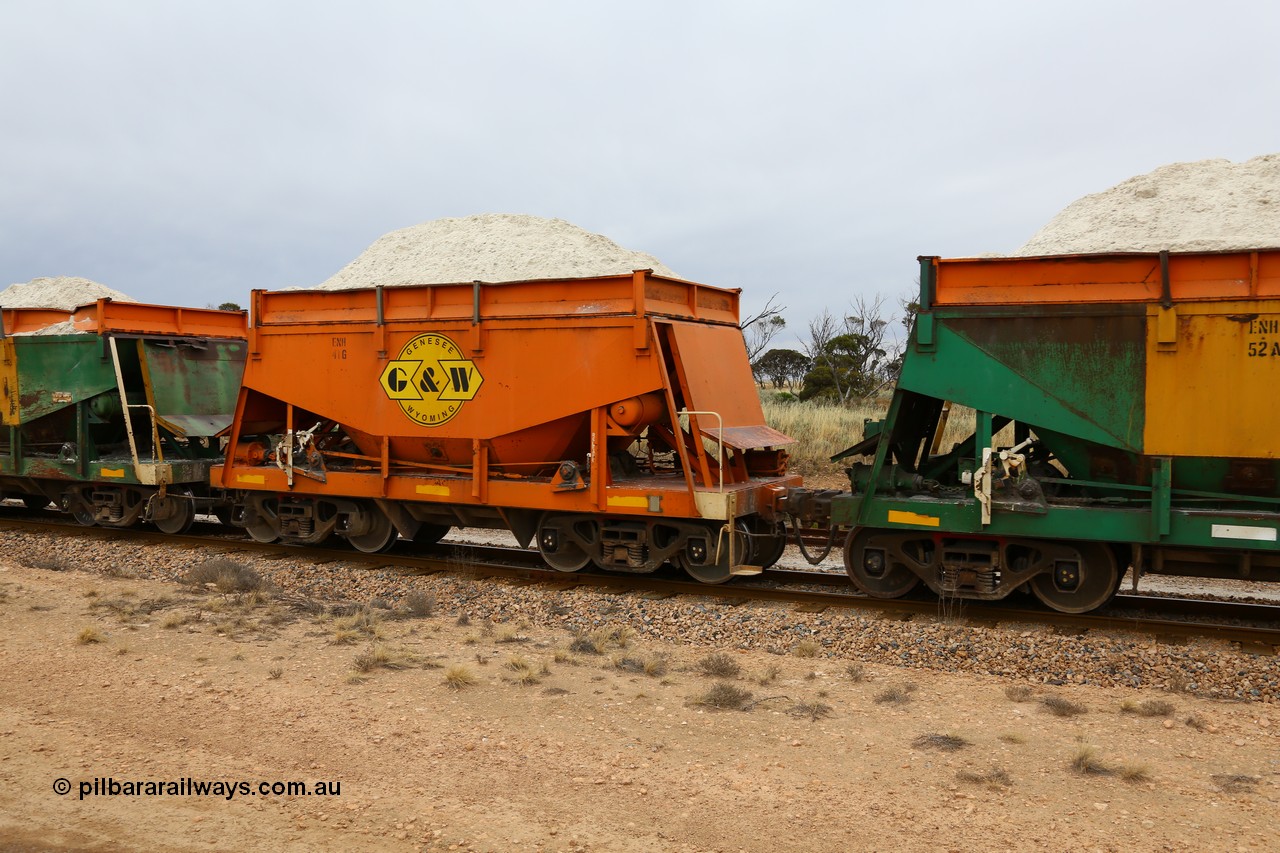 161109 1950
Moule, originally built by Kinki Sharyo as the NH type for the NAR in 1968, sent to Port Lincoln in 1978, then rebuilt and recoded ENH type in 1984, ENH 41, refurbished and wearing current owner Genesee & Wyoming orange and decal with matching hungry boards loaded with gypsum.
Keywords: ENH-type;ENH41;Kinki-Sharyo-Japan;NH-type;