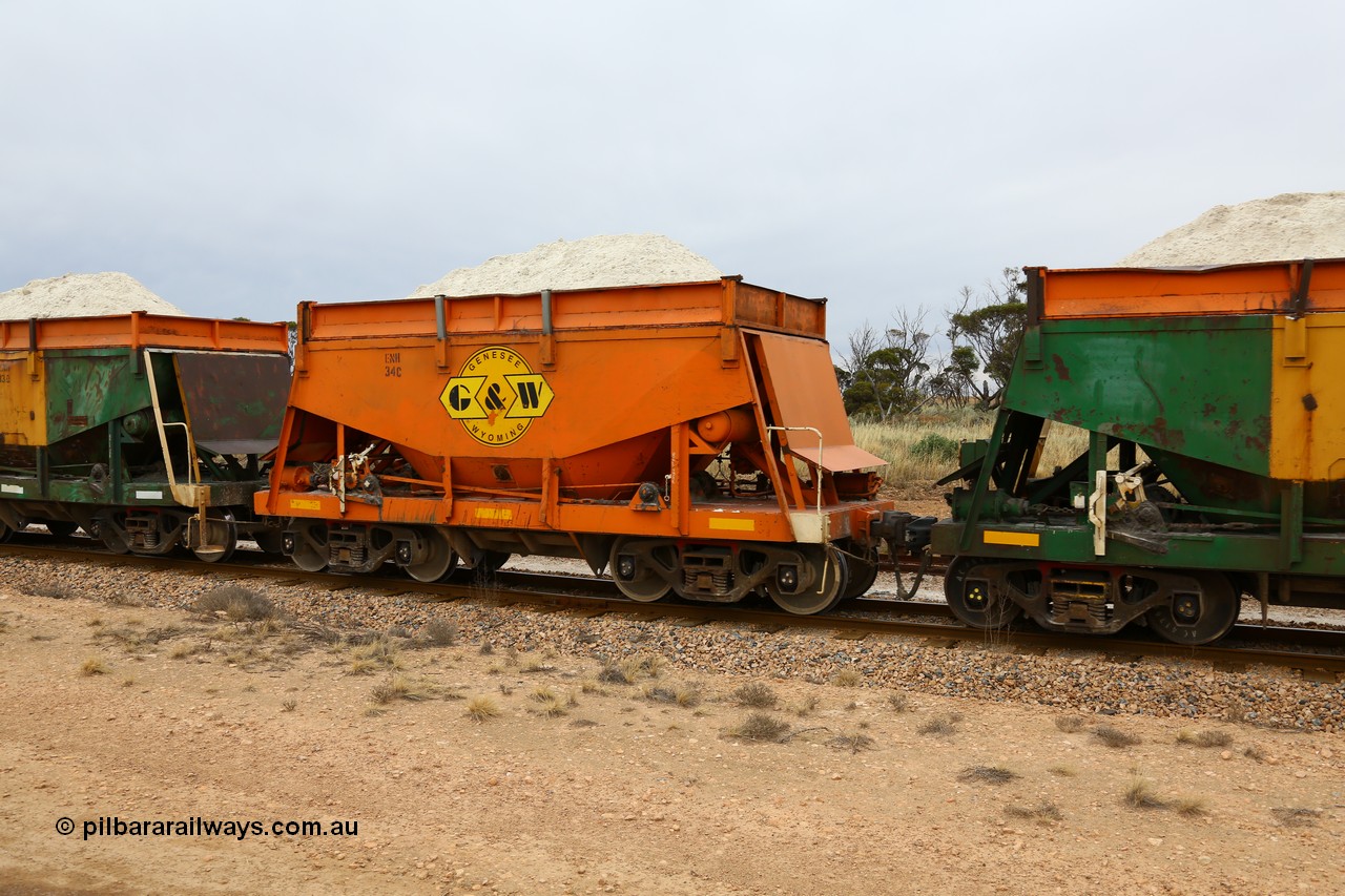 161109 1954
Moule, originally built by Kinki Sharyo as the NH type for the NAR in 1968, sent to Port Lincoln in 1978, then rebuilt and recoded ENH type in 1984, ENH 34, refurbished and wearing current owner Genesee & Wyoming orange and decal with matching hungry boards loaded with gypsum.
Keywords: ENH-type;ENH34;Kinki-Sharyo-Japan;NH-type;NH934;
