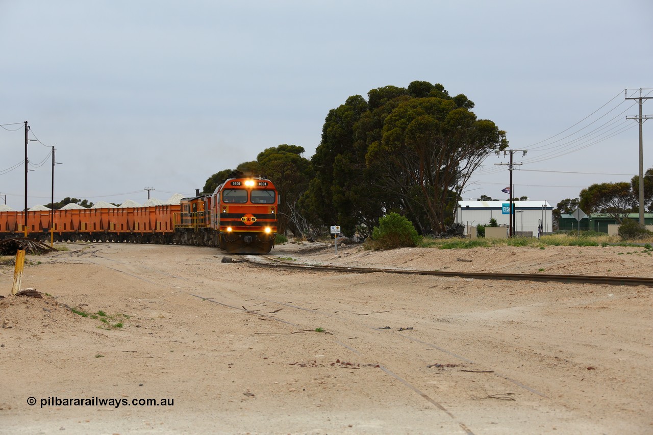 161109 1966
Thevenard, train 4DD4 enters the yard behind Genesee & Wyoming locomotives Clyde Engineering EMD model JL22C unit 1601 serial 71-728 and 1603 serial 71-730 as they negotiate the yard to the GRA siding balloon for unloading.
Keywords: 1600-class;1601;Clyde-Engineering-Granville-NSW;EMD;JL22C;71-728;NJ-class;NJ1;