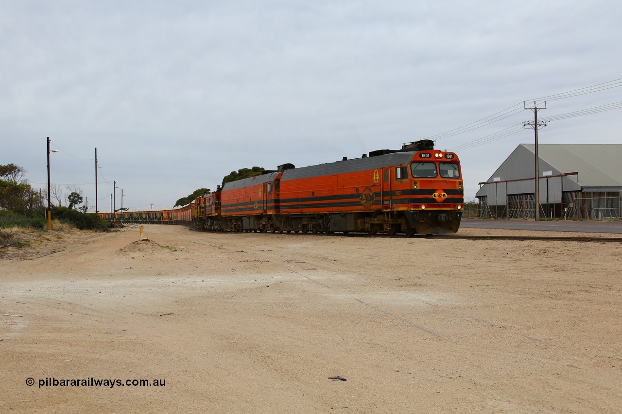 161109 1969
Thevenard, train 4DD4 enters the yard behind Genesee & Wyoming locomotives Clyde Engineering EMD model JL22C unit 1601 serial 71-728 and 1603 serial 71-730 as they negotiate the yard to the GRA siding balloon for unloading.
Keywords: 1600-class;1601;Clyde-Engineering-Granville-NSW;EMD;JL22C;NJ-class;NJ1;