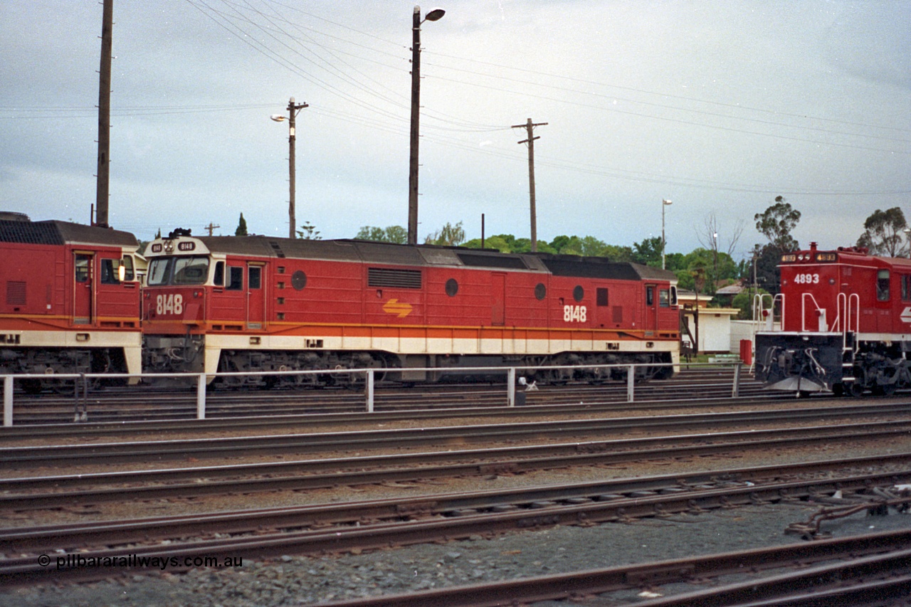 100-06
Albury yard, NSWSRA standard gauge 81 class 8148 Clyde Engineering EMD model JT26C-2SS serial 84-1067, candy livery.
Keywords: 81-class;8148;Clyde-Engineering-Kelso-NSW;EMD;JT26C-2SS;84-1067;